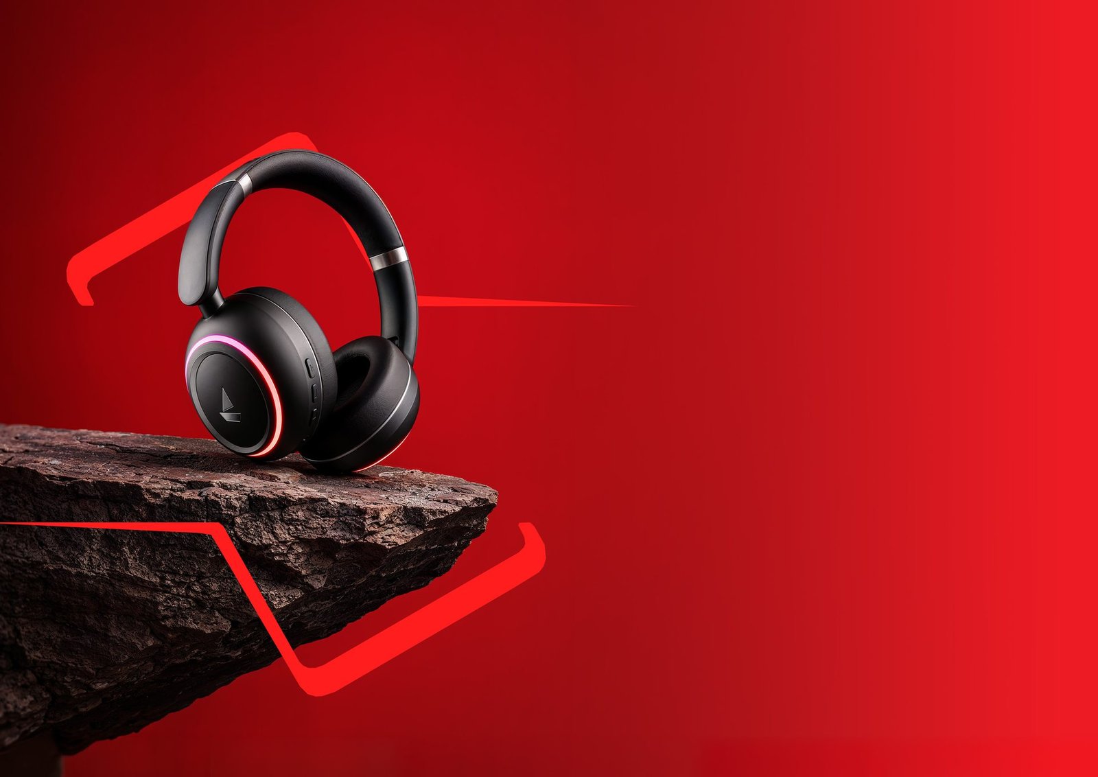 Over-ear headphones perched on a red cliff edge