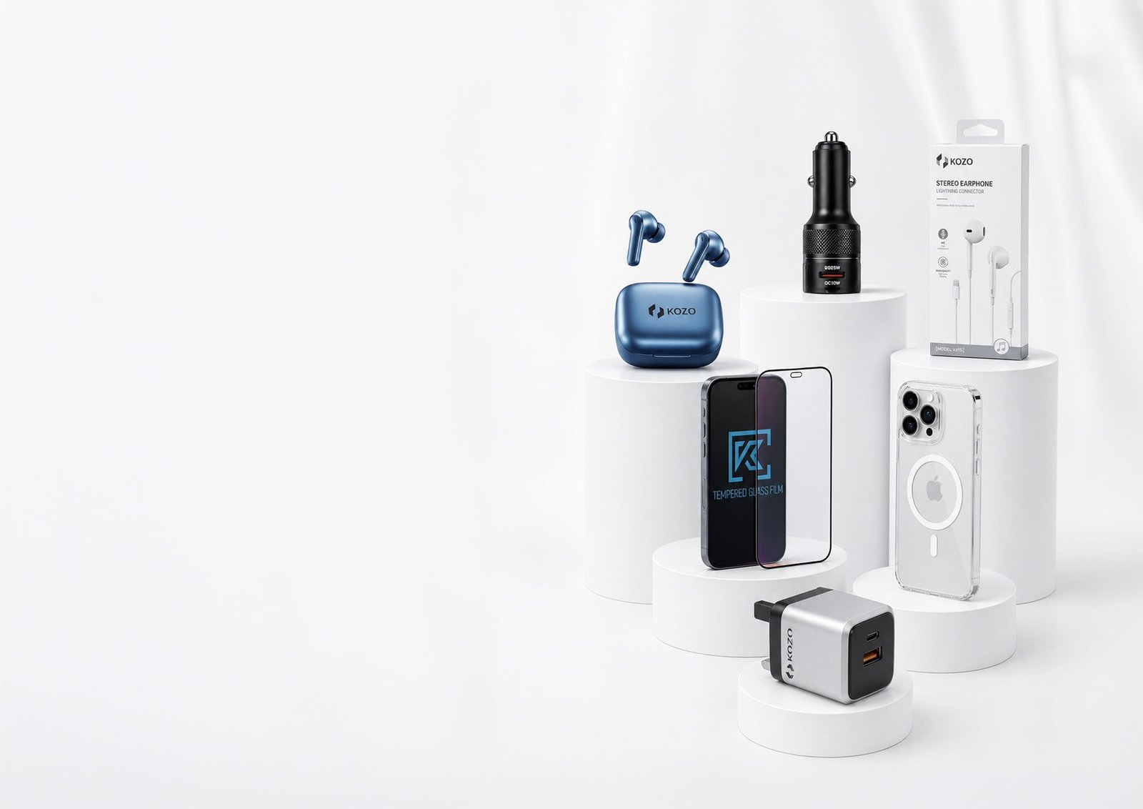 Own-brand chargers, earbuds and accessories staged on white podiums